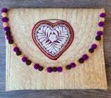 Heart palm clutch