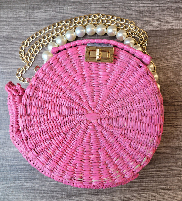 Pink snail palm purse