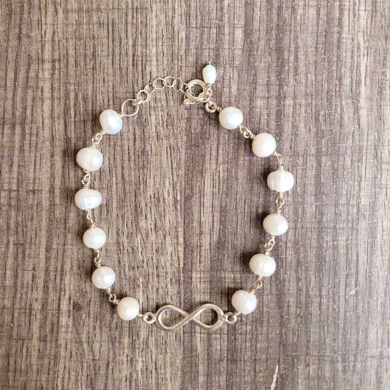 Infinite / pearls 925 silver bracelet